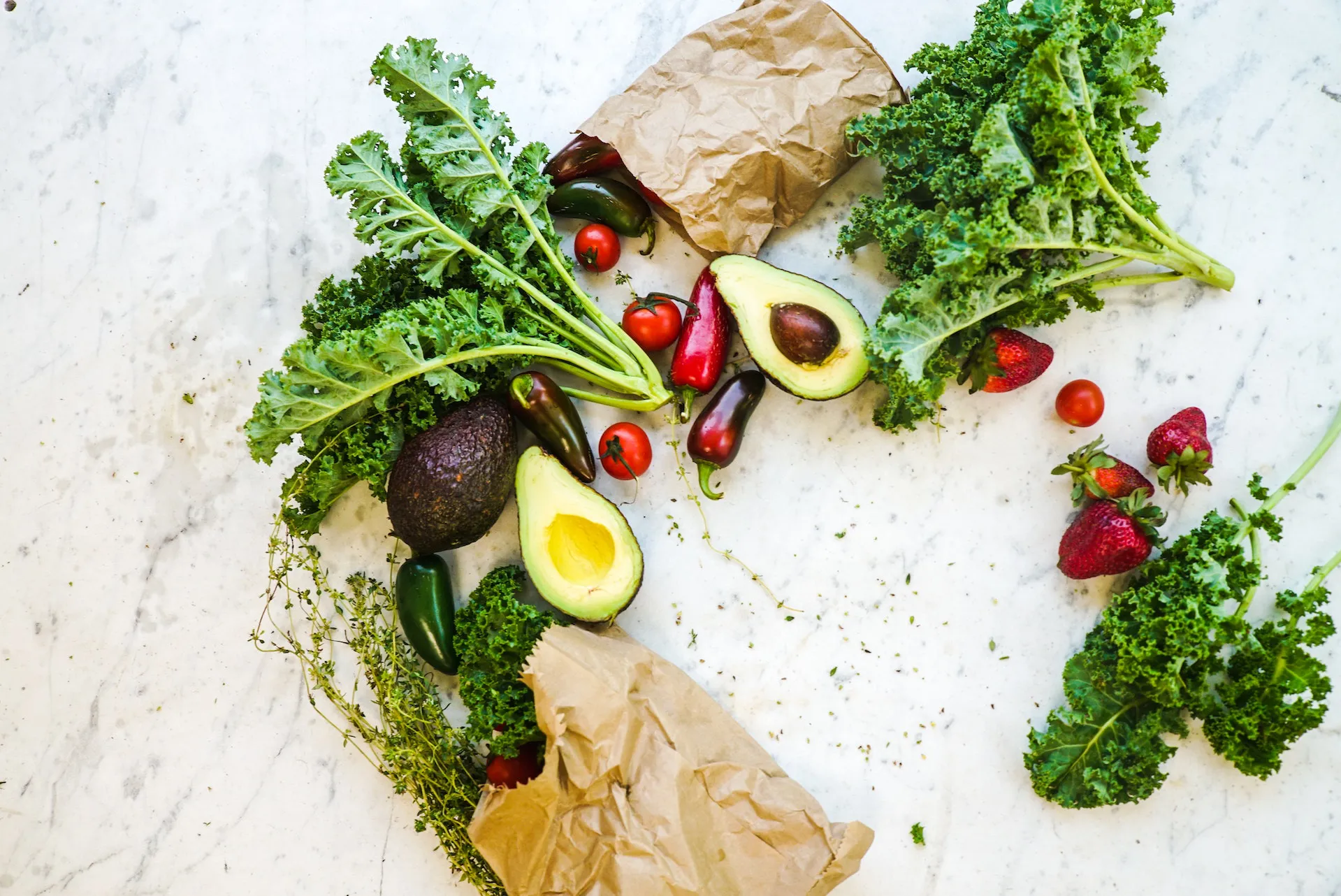Green leafy vegetables, avocados, tomatoes, and peppers