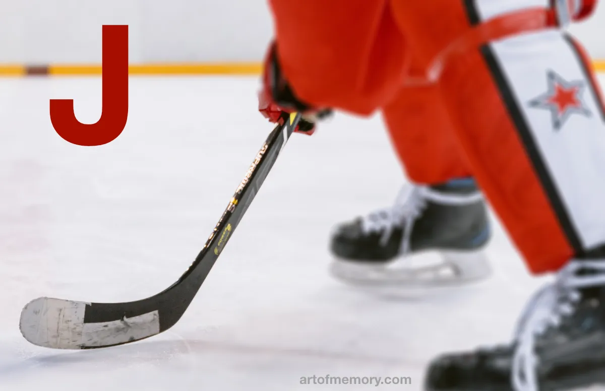 A hockey stick could represent the letter J in a peg list