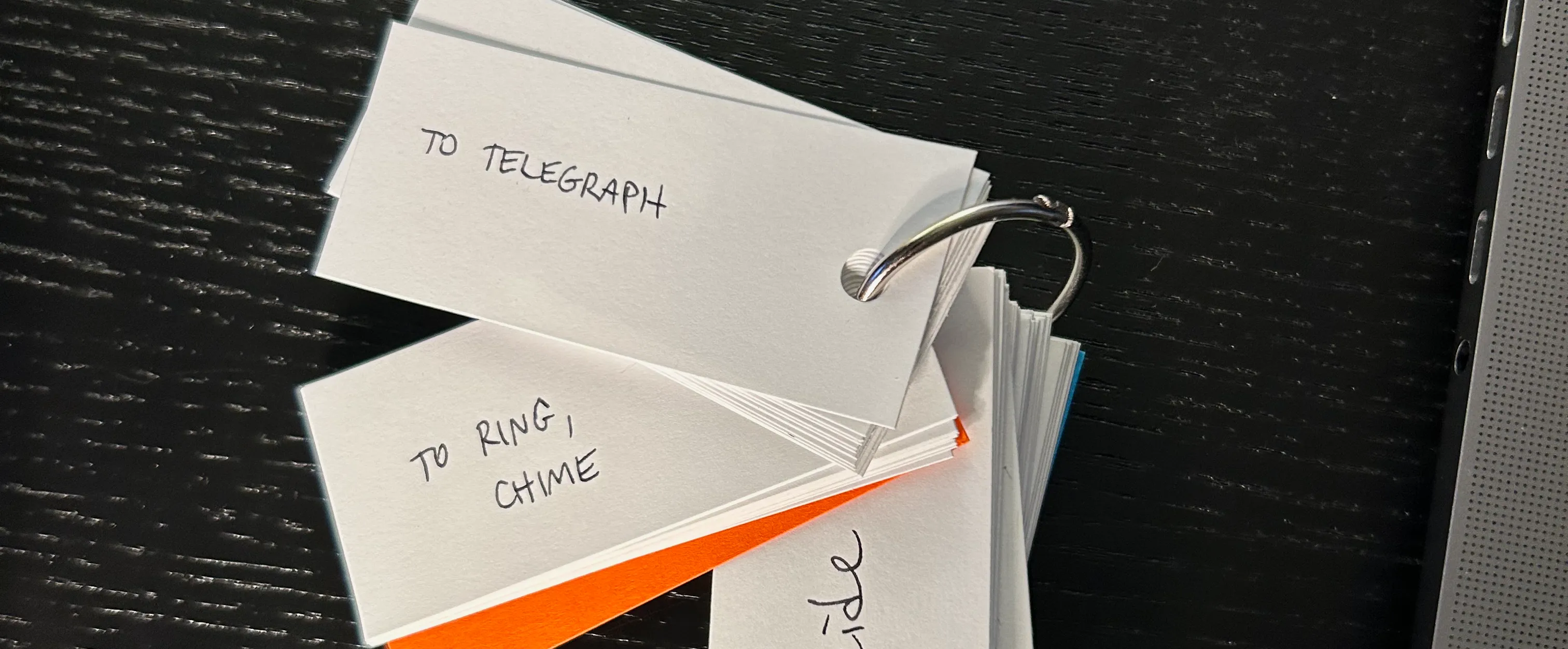 Mini flashcards with vocabulary words written on them