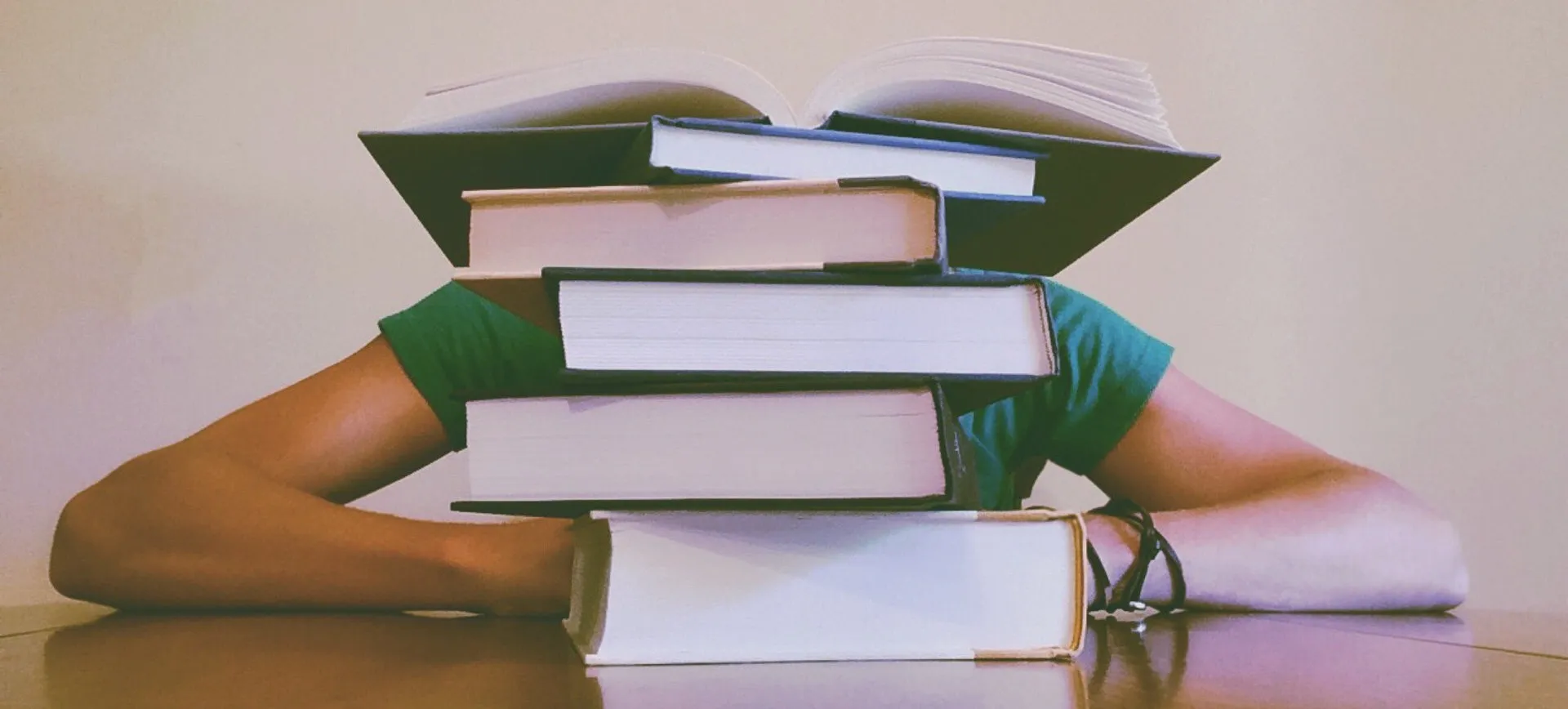 Student studying from books